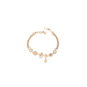 Elegant rose gold charm bracelet featuring snowflake motifs, sparkling diamond accents, and playful dangling charms on a multi-chain adjustable bracelet.