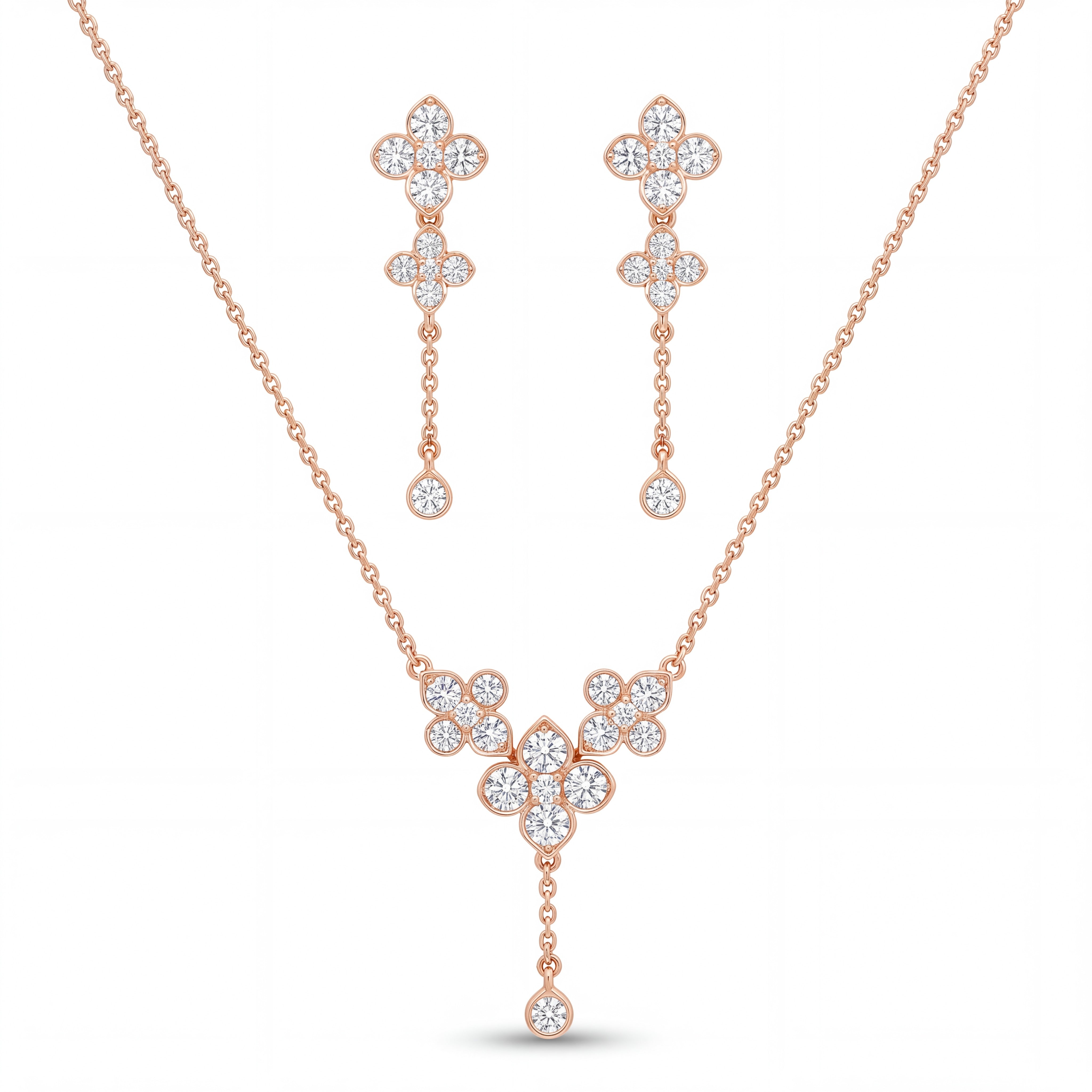 Elegant rose gold diamond jewelry set featuring a floral drop pendant necklace with matching dangling floral earrings on a white background.