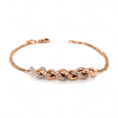 Elegant rose gold bracelet featuring intertwined infinity-style links adorned with sparkling diamond accents on a delicate chain with an adjustable clasp.