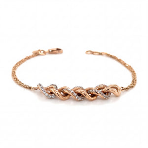 Elegant rose gold bracelet featuring intertwined infinity-style links adorned with sparkling diamond accents on a delicate chain with an adjustable clasp.