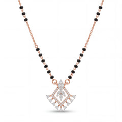 Elegant rose gold mangalsutra necklace featuring black beads and a royal-inspired diamond drop pendant with intricate sparkling detailing on a white background.