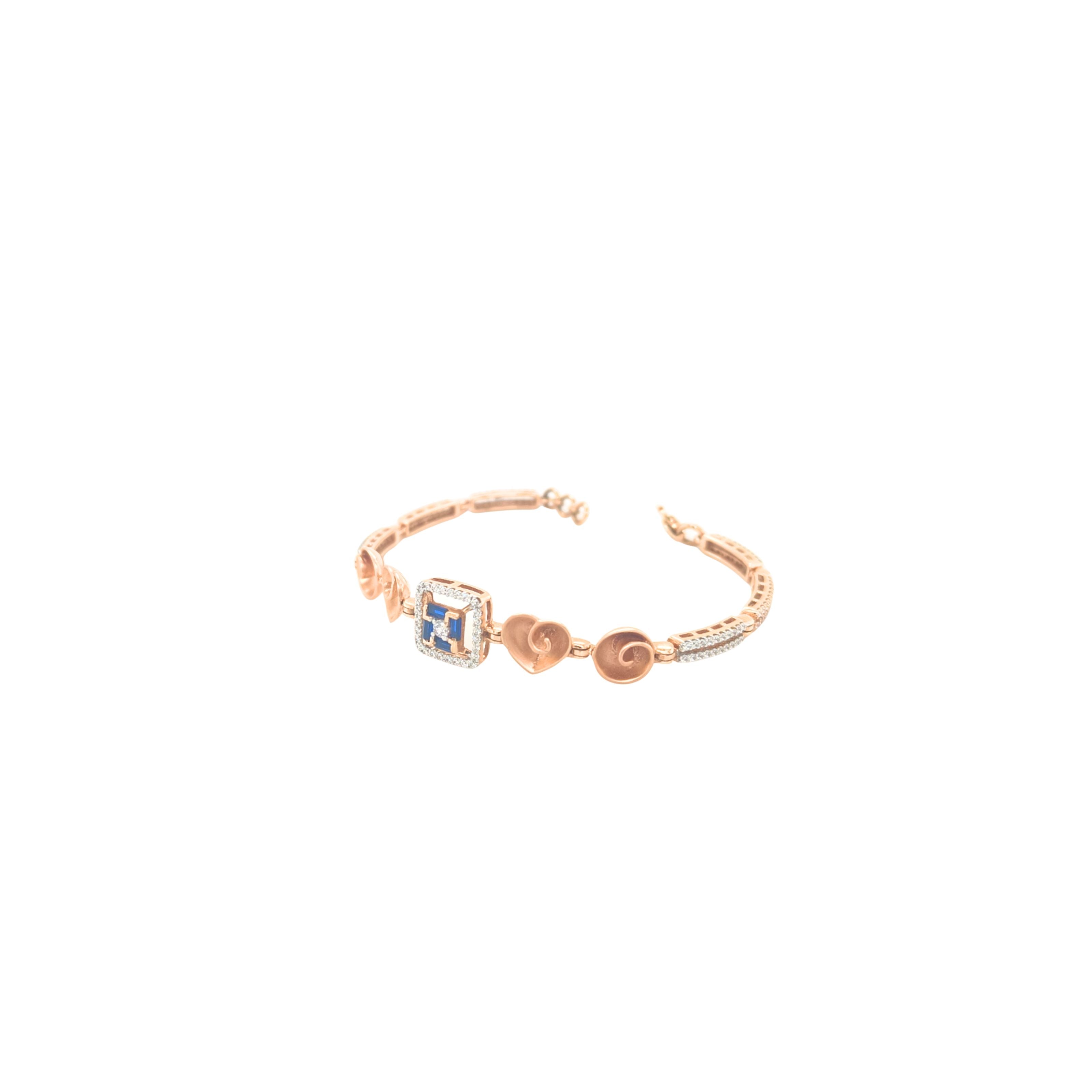 Elegant rose gold bracelet featuring heart motifs, a square blue sapphire centerpiece, and sparkling diamond accents with an adjustable clasp on a white background.