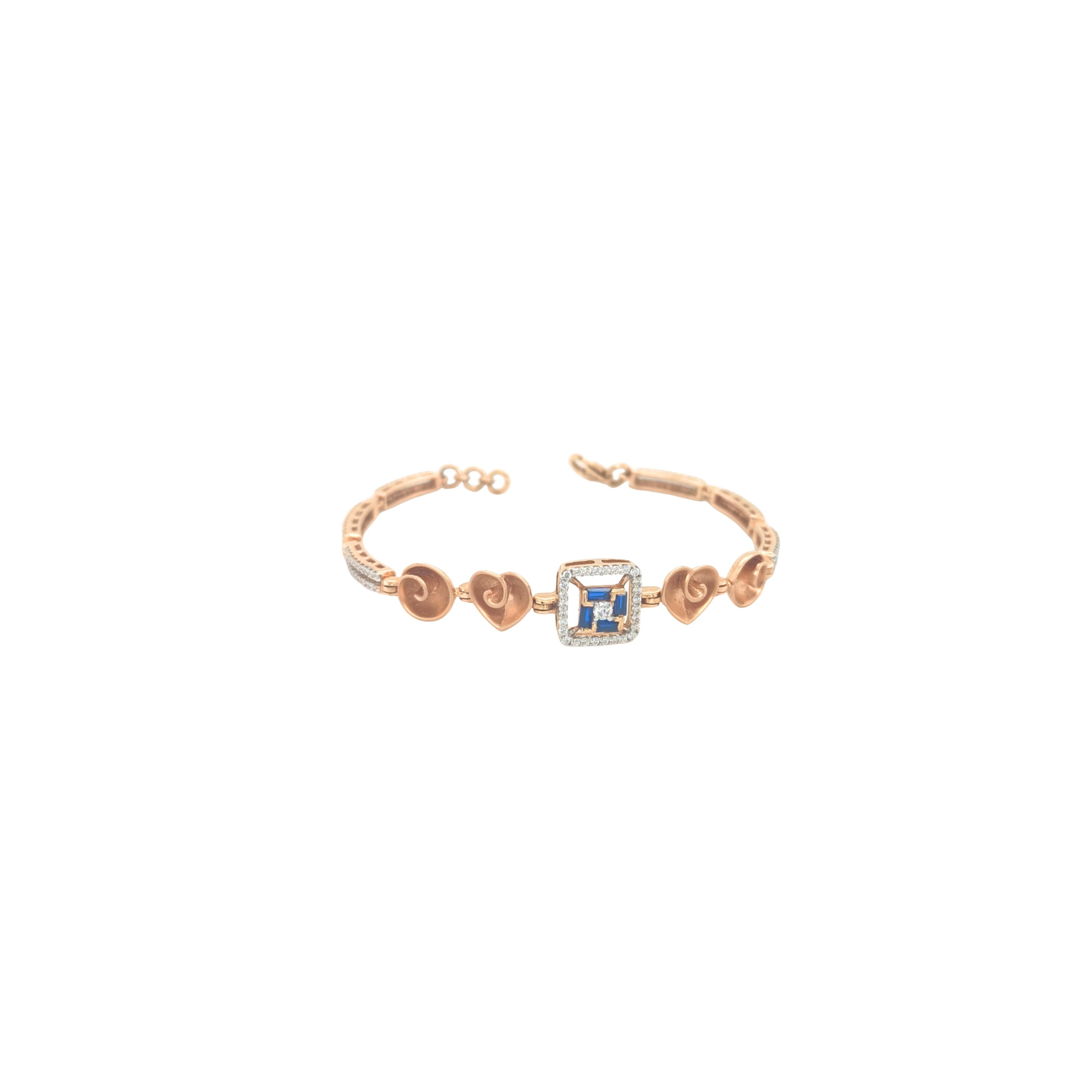 Elegant rose gold bracelet featuring heart motifs, a square blue sapphire centerpiece, and sparkling diamond accents with an adjustable clasp on a white background.