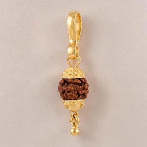 Yellow gold pendant featuring a natural Rudraksha bead encased with decorative gold caps and a small dangling gold bead, symbolizing spirituality and protection.