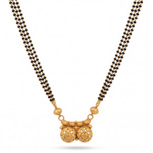 Elegant 22K gold mangalsutra necklace with triple black bead chains, textured gold side beads, and intricate dual motif pendant on a white background by Pachchigar Jewellers Ashokbhai.