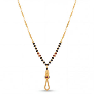 Elegant 22K gold mangalsutra necklace with black bead chain, ruby accent side details, and ornate tassel pendant with red stones on a white background by Pachchigar Jewellers Ashokbhai.