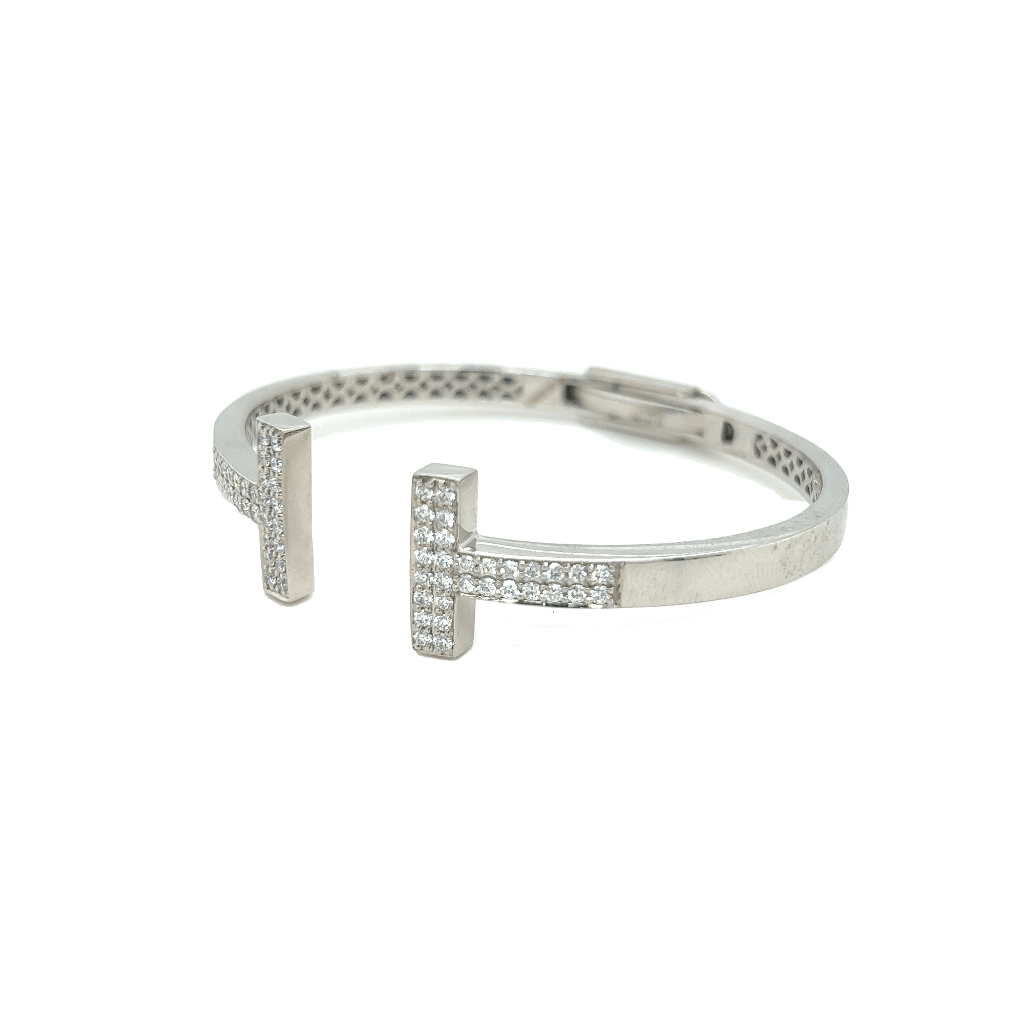 Tiffany T diamond hinged bangle in 18k gold small  Tiffany  Co
