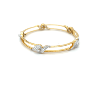 18K Fancy Diamond Bangle in White Gold with Baguette Design