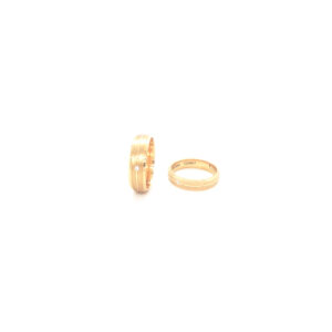 22K Matching Yellow Gold Rings Signifying Enduring Love