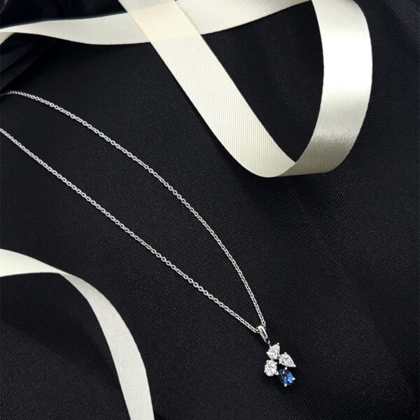 Modern muse: Blue-accented Pendant Set with diamond sparkle And Studs Earring