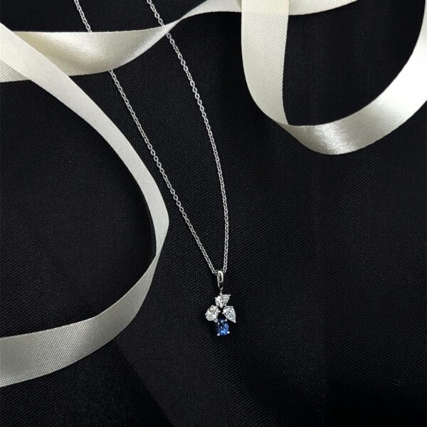 Modern muse: Blue-accented Pendant Set with diamond sparkle And Studs Earring