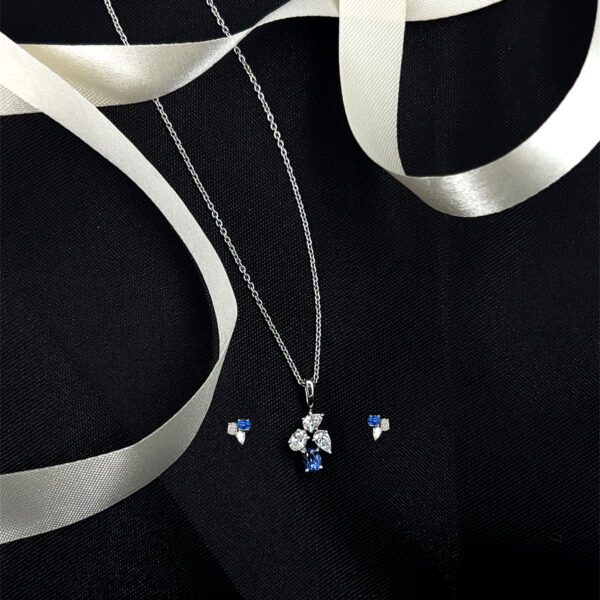 Modern muse: Blue-accented Pendant Set with diamond sparkle And Studs Earring
