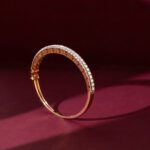 18KT rose gold diamond bangle delicate yet striking, design